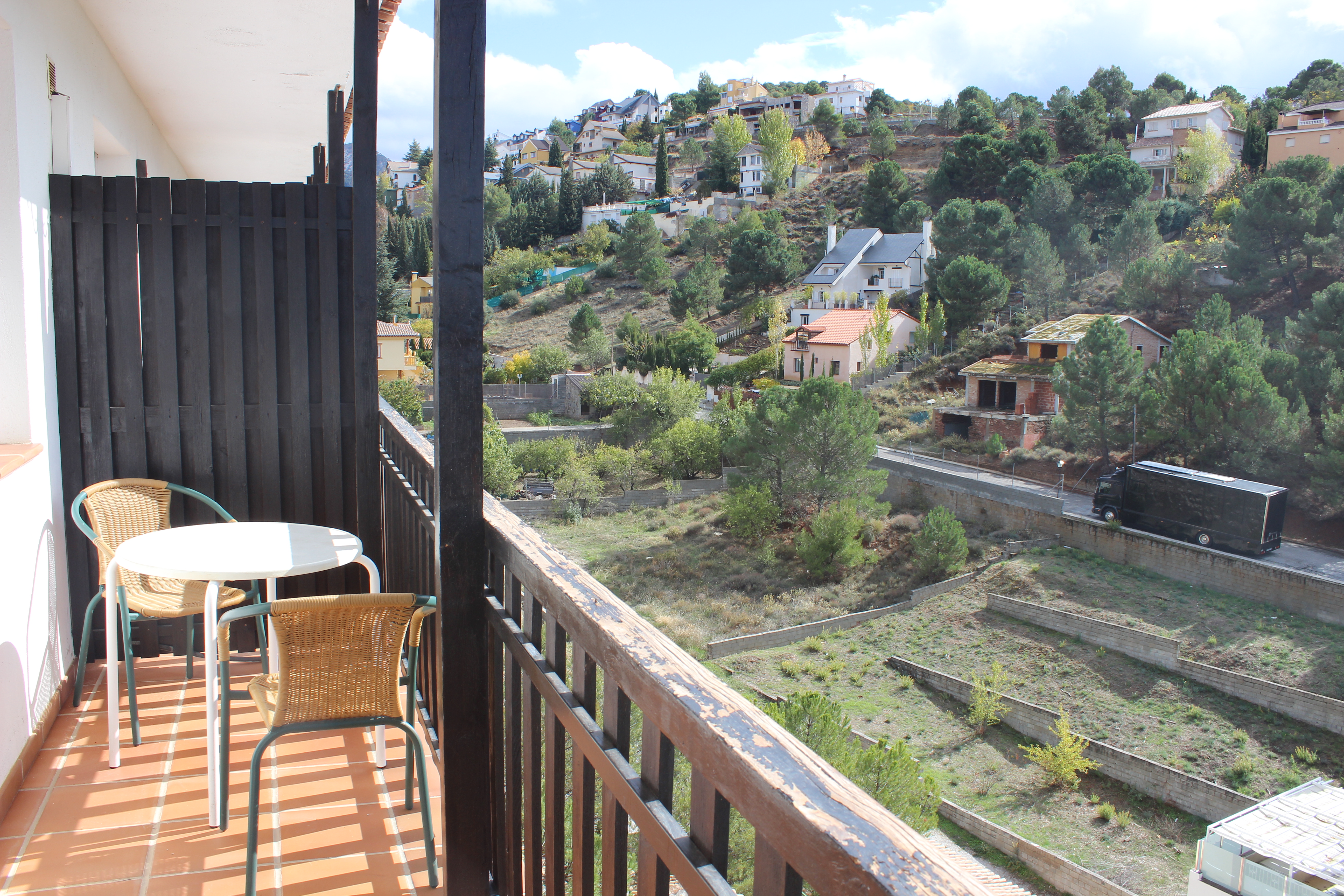 View of the balcony of 5 square meters approx. Available in rooms with views of the surrounding mountains.